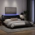 Estructura de cama con luces LED tela negro 180x200