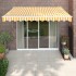 Toldo retráctil aluminio y tela amarillo y blanco 3,5x2,5