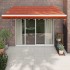 Toldo retráctil automático naranja y marrón 3x2,5