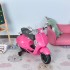 Moto eléctrica Vespa rosa