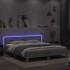 Estructura de cama cabecero y luces LED gris hormigón