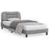 Estructura de cama con luces LED tela gris claro 90x200