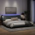 Estructura de cama con luces LED tela gris claro 200x200