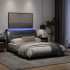 Estructura de cama con luces LED tela gris claro 140x200