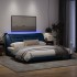 Estructura de cama con luces LED tela azul 180x200