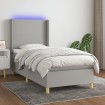 Cama box spring colchón y luces LED tela gris claro 90x190 cm