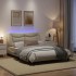 Estructura de cama con luces LED tela crema 140x200