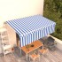 Toldo retráctil automático con persiana azul y blanco 5x3