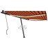 Toldo manual retráctil con LED naranja y marrón 450x300