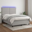 Cama box spring colchón y luces LED tela gris claro 140x200 cm