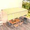 Toldo retráctil automático con persiana amarillo y blanco 6x3 m